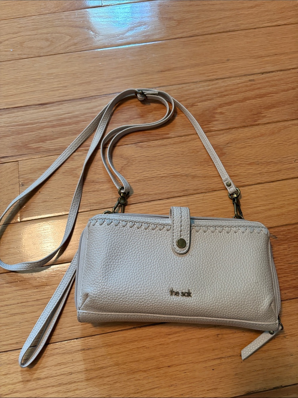 The Sak Cream Pebbled Crossbody Wallet